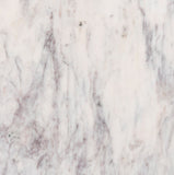 Formentera Dining Table - Elegant Handcrafted Marble Design with Unique Shape for Modern Spaces
