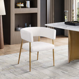 Creston Dining Chair: Elegant Upholstered Design with Luxurious Brushed Gold Frame for Modern Spaces