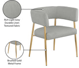 Creston Dining Chair: Elegant Upholstered Design with Luxurious Brushed Gold Frame for Modern Spaces