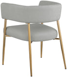 Creston Dining Chair: Elegant Upholstered Design with Luxurious Brushed Gold Frame for Modern Spaces