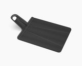 Chop2Pot™ Plus Black Folding Chopping Board
