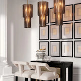 Chandelier Imperial S
Brushed brass finish | smoke glass