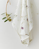 Linen tea towel in Olive orchard print on white