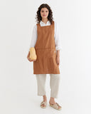 Pinafore cross-back linen apron in Cinnamon