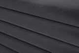 Lorenzo Contemporary Ottoman: Luxurious Velvet, Deep Channel Tufting, Versatile Coffee Table Design