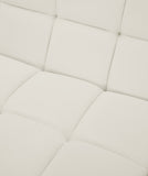 Relax Contemporary Armless Chair with Soft Upholstery, Biscuit Tufting & Modular Design for Versatility