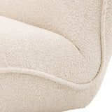 Swivel Chair Relax
BouclŽ cream | brushed brass finish swivel base