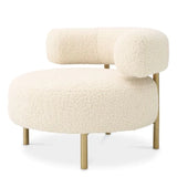 Chair Thompson
Faux shearling | brushed brass finish legs