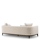 Sofa Brannan
Bouclé chalk white | brown wooden base
