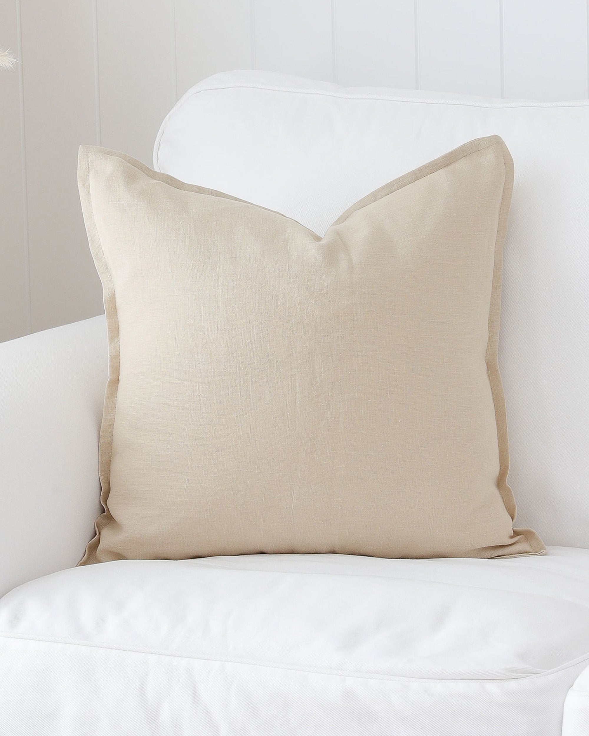 Deco pillow cover with buttons in Natural linen