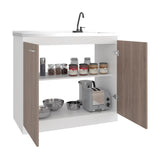 Napoles Utility Sink with Faucet Inclued and Integrated Steel Counter top, Freestanding cabinet with two doors, Metal Handles and Two interior shelves.