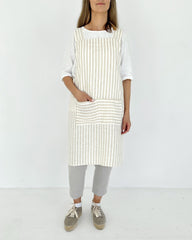 Pinafore cross-back linen apron in Striped natural