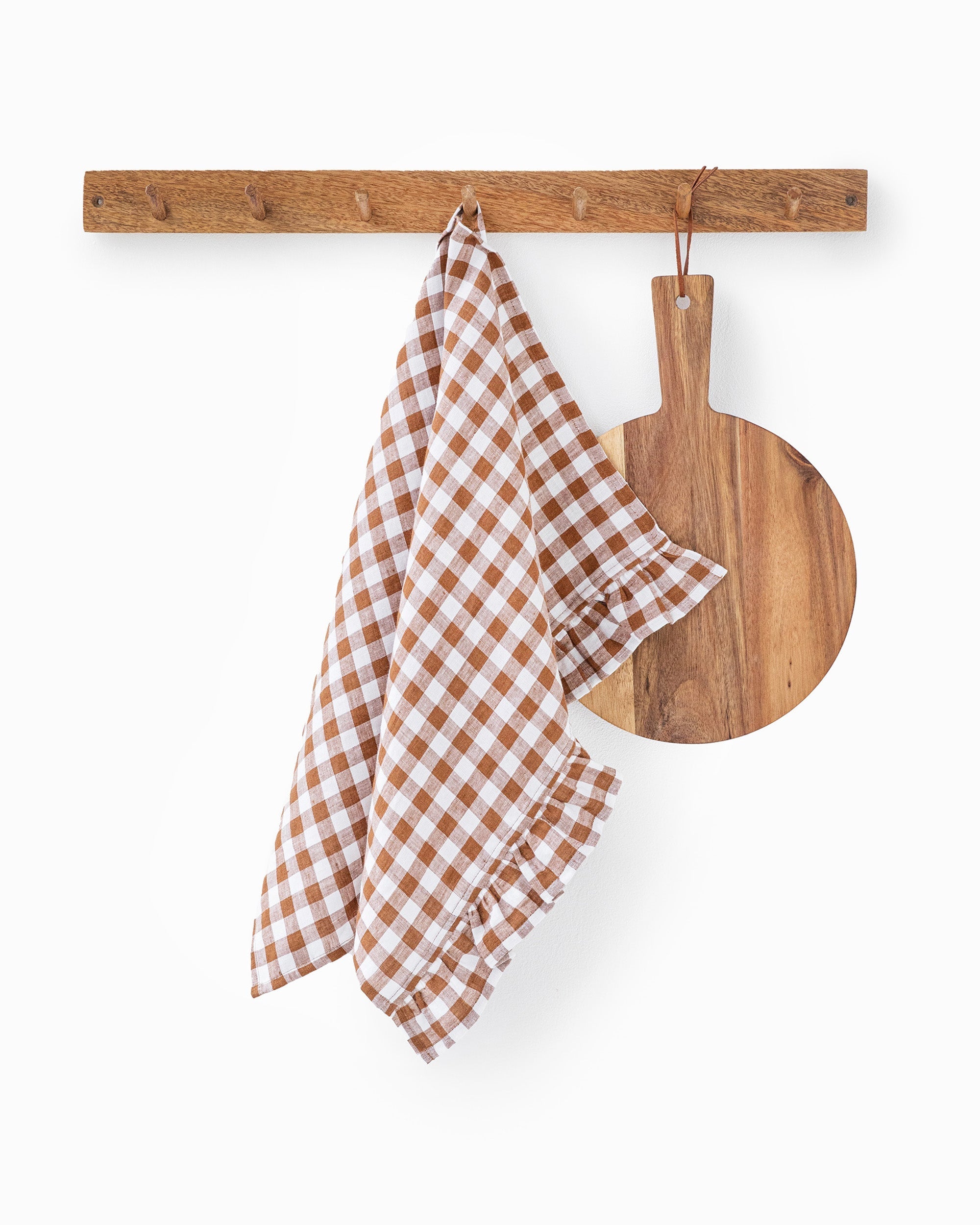 Ruffle trim linen tea towel in Cinnamon gingham