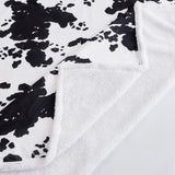 Elsa Cowhide Campfire Sherpa Throw