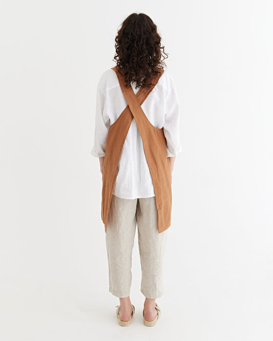 Pinafore cross-back linen apron in Cinnamon