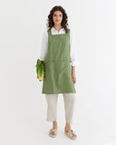 Pinafore cross-back linen apron in Forest green