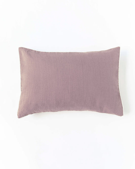 Pom pom trim linen pillowcase in Woodrose