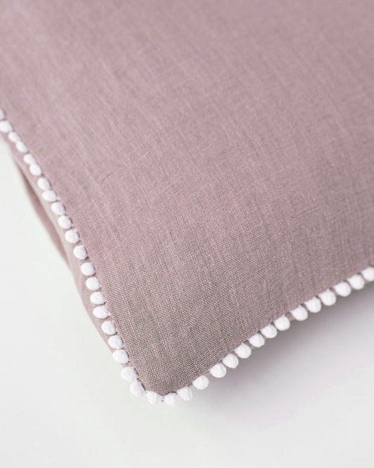 Pom pom trim linen pillowcase in Woodrose