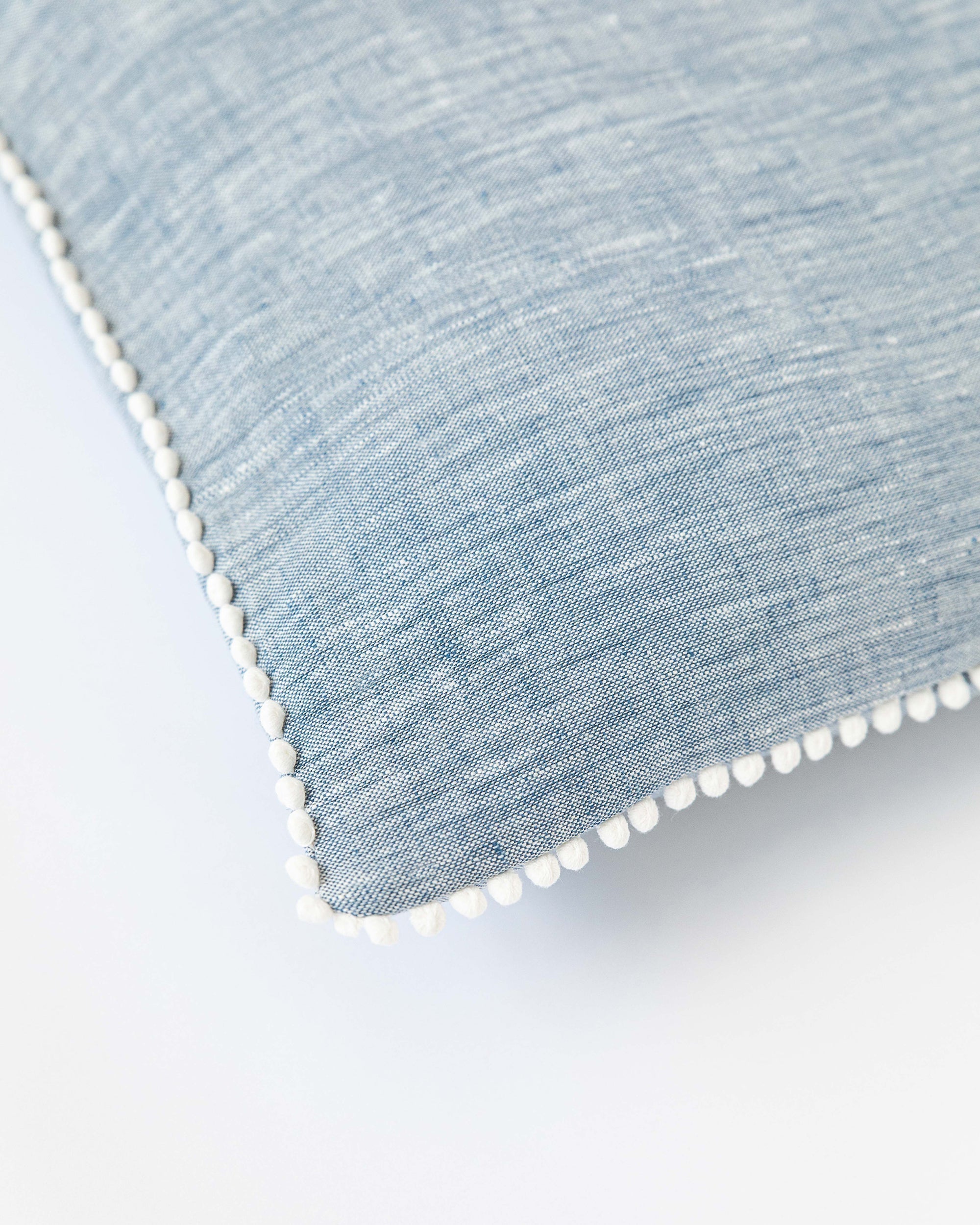 Pom pom trim linen pillowcase in Blue melange