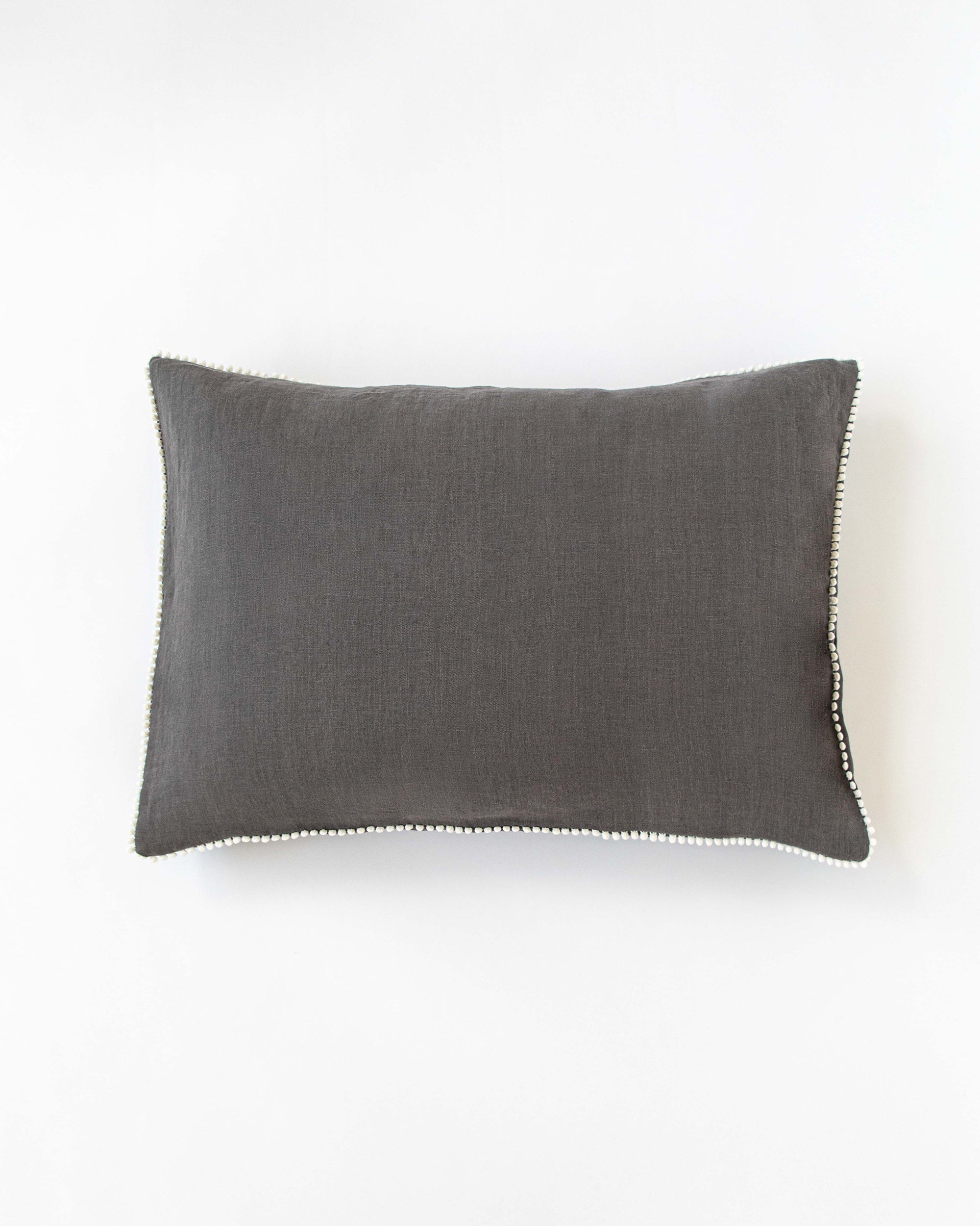 Pom pom trim linen pillowcase in Charcoal gray