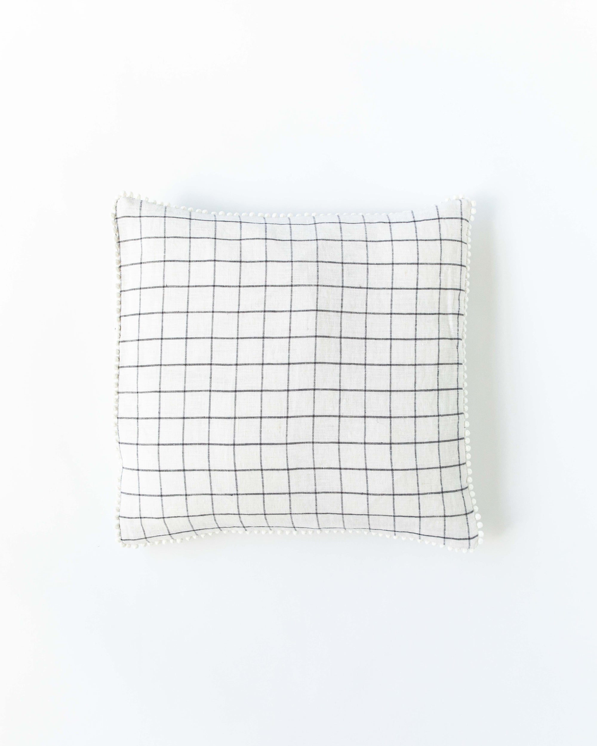 Pom pom trim linen pillowcase in Charcoal grid