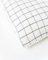 Pom pom trim linen pillowcase in Charcoal grid