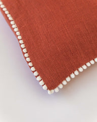 Pom pom trim linen pillowcase in Clay