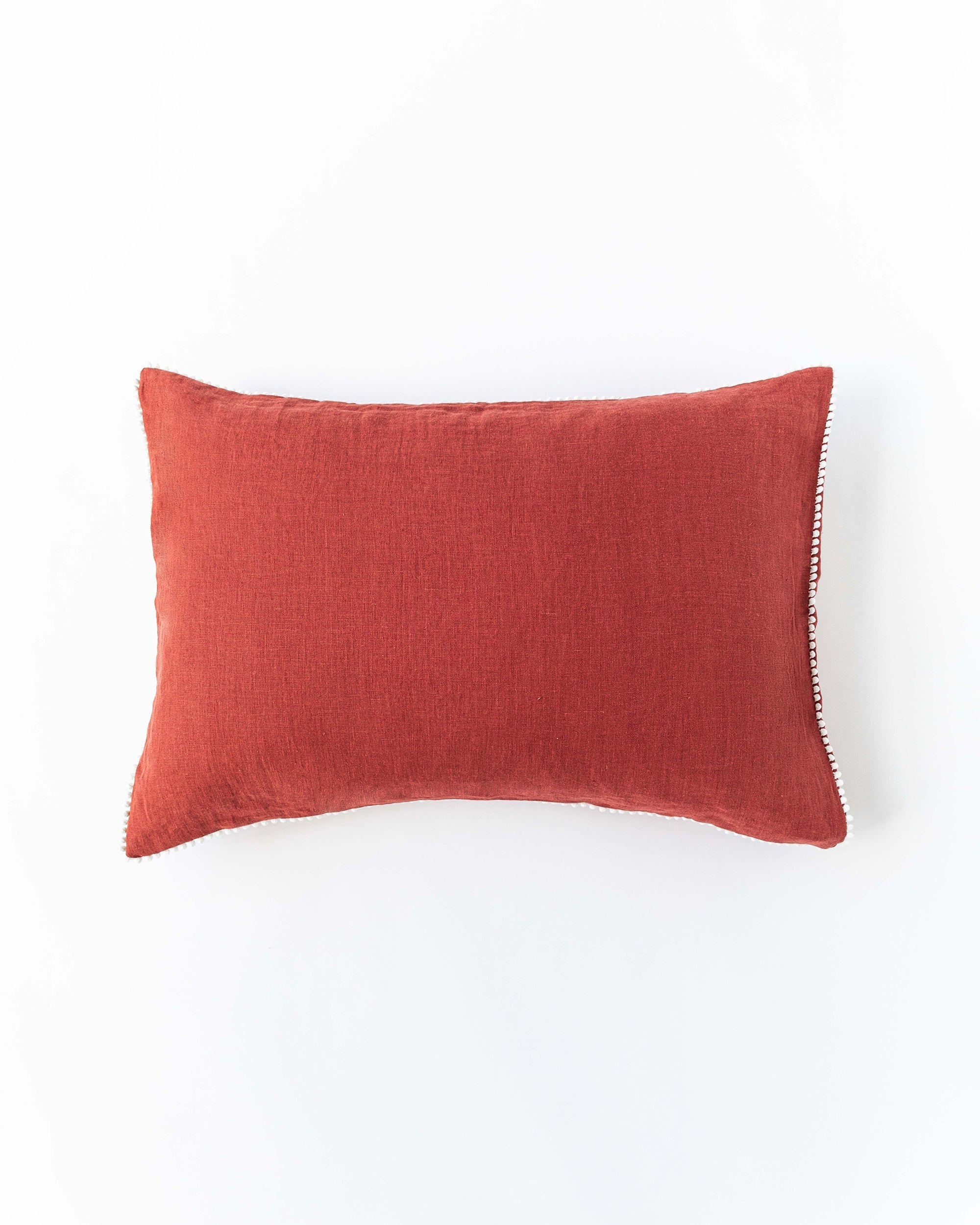 Pom pom trim linen pillowcase in Clay