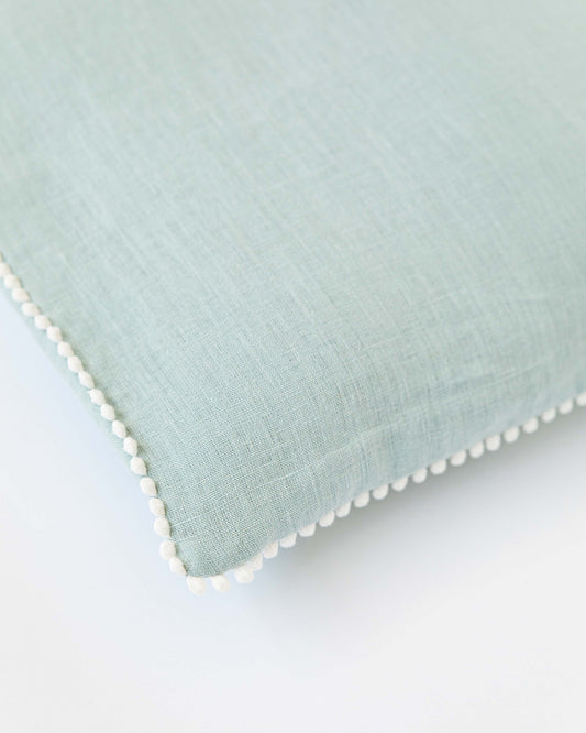 Pom pom trim linen pillowcase in Dusty Blue