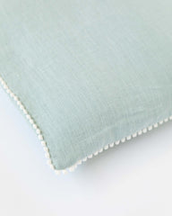 Pom pom trim linen pillowcase in Dusty Blue