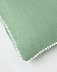 Pom pom trim linen pillowcase in Matcha green