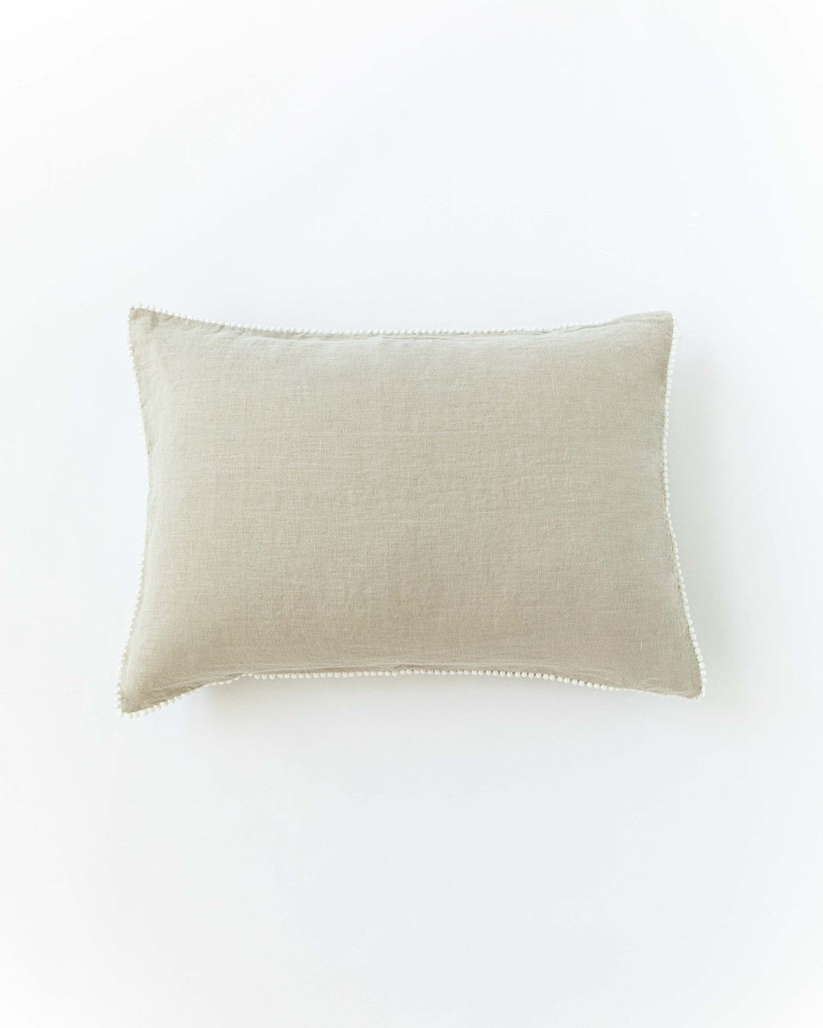 Pom pom trim linen pillowcase in Natural linen