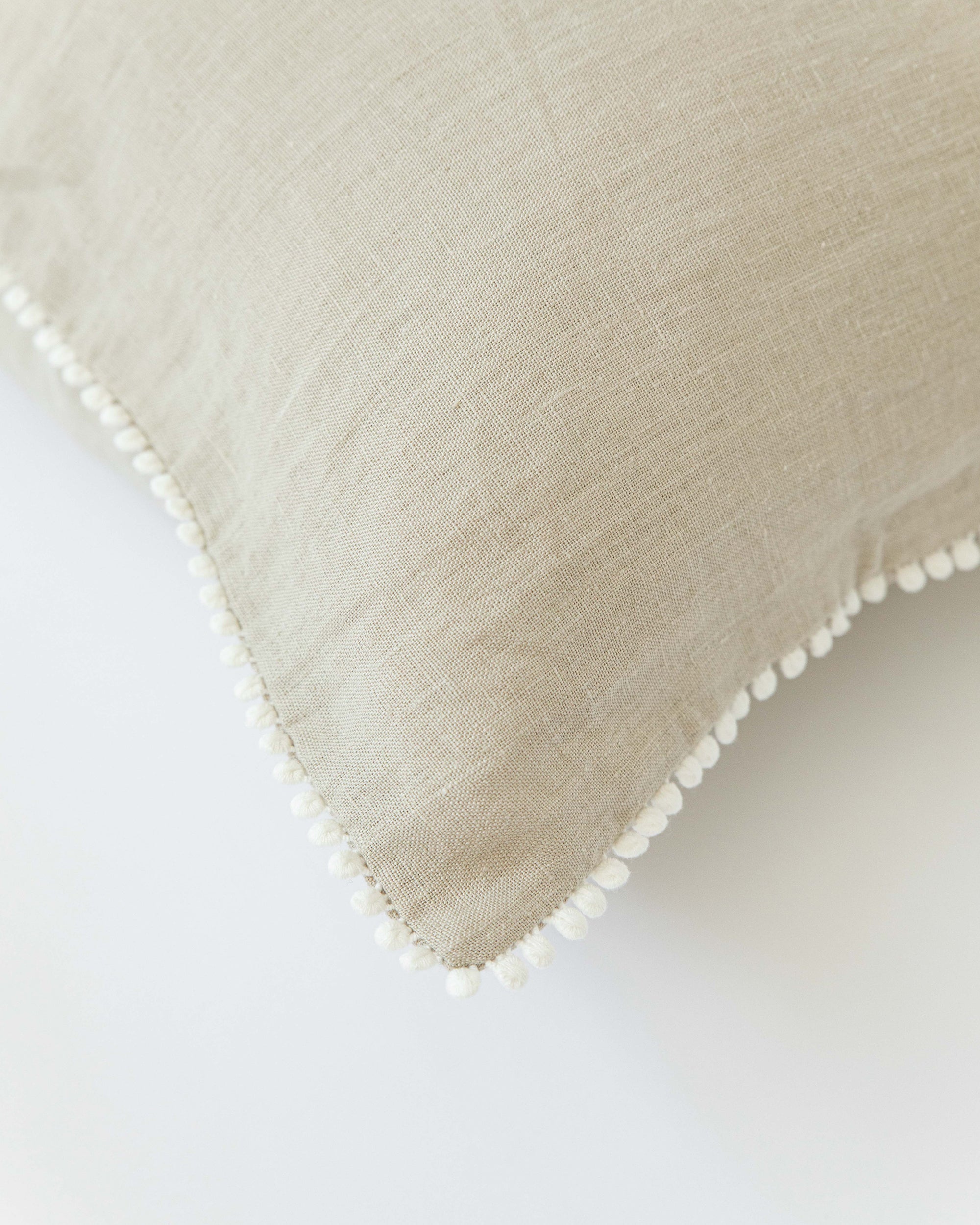 Pom pom trim linen pillowcase in Natural linen