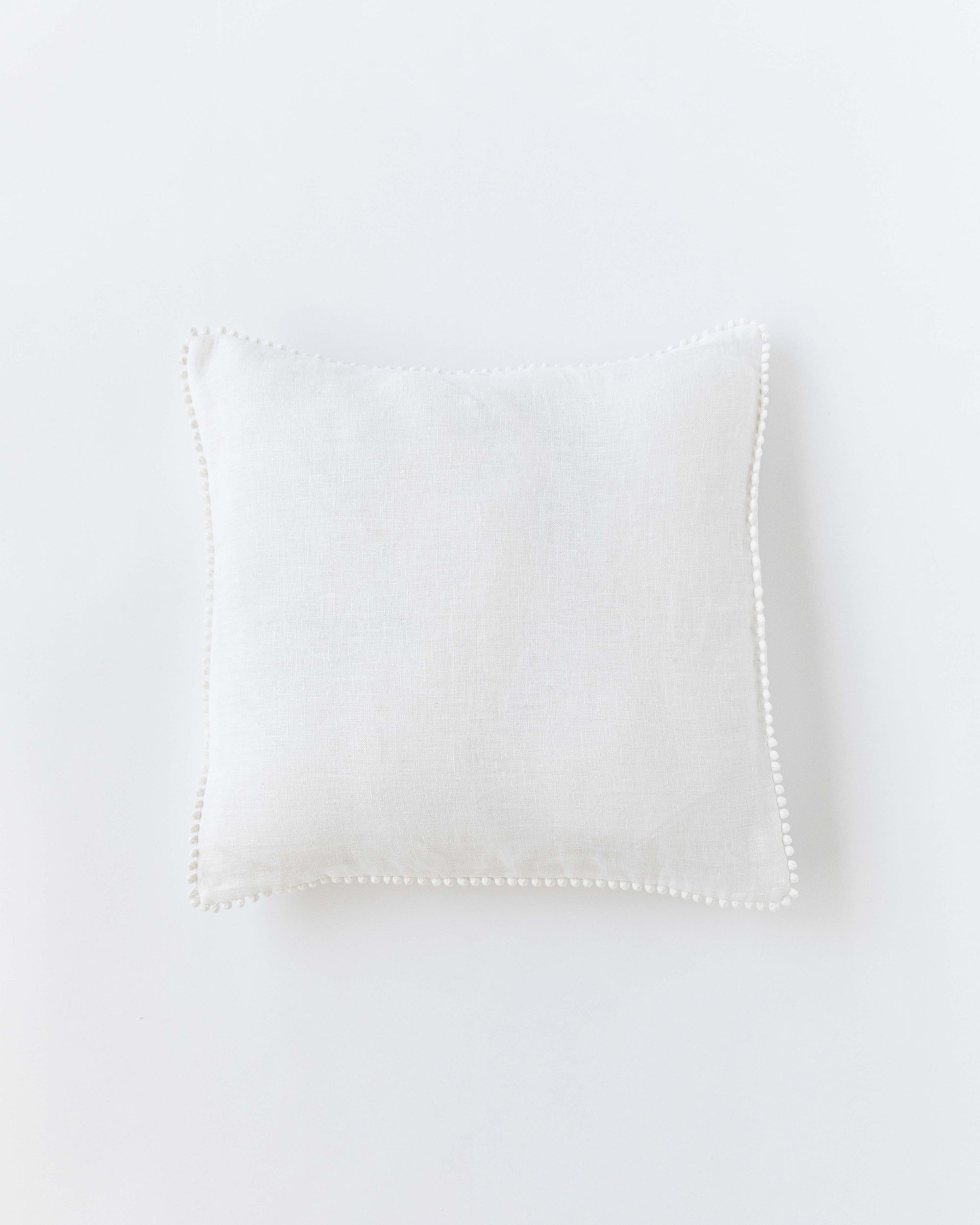 Pom pom trim linen pillowcase in White