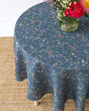 Round linen tablecloth in Wildflowers print on deep navy blue