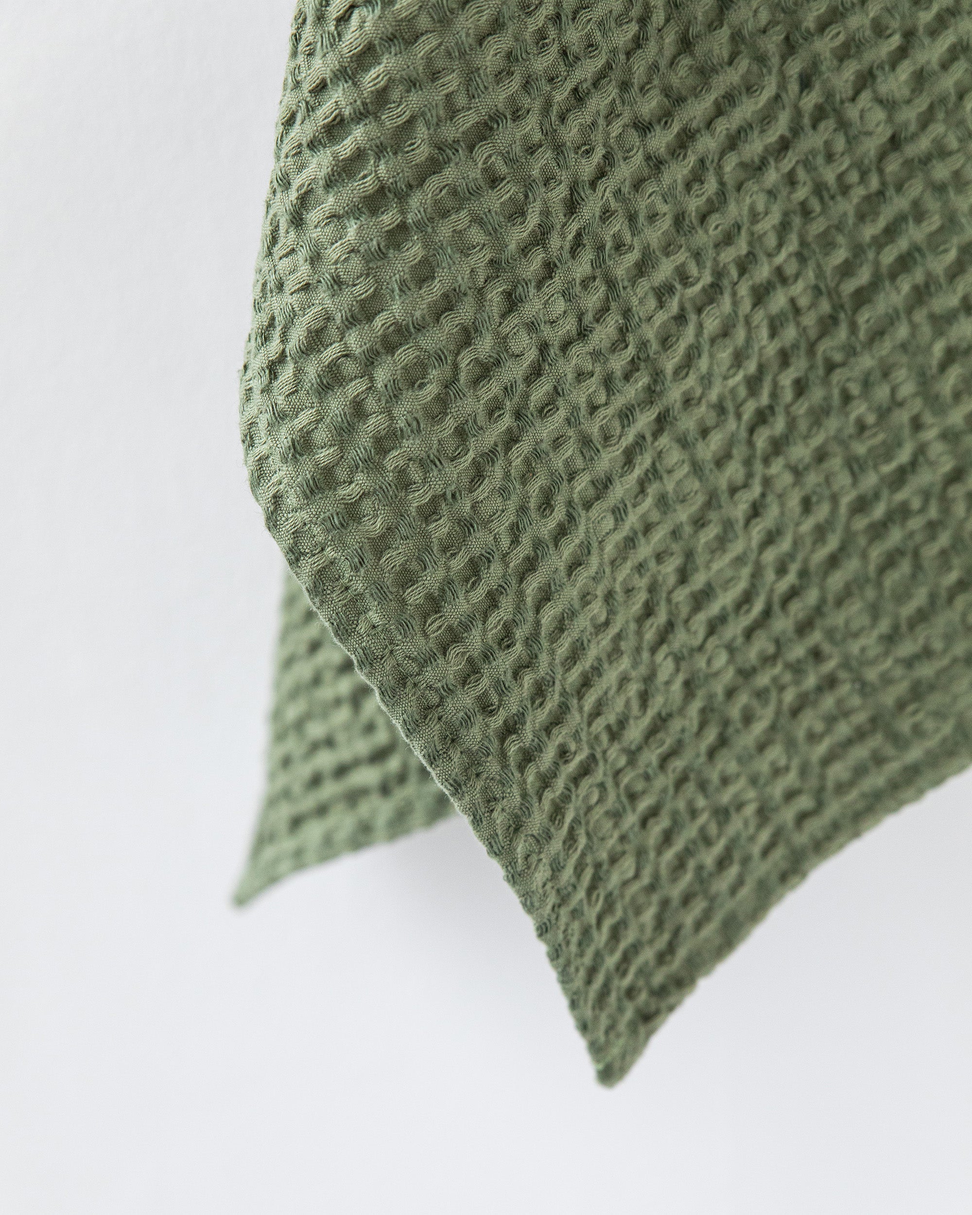 Waffle face towel in Forest green